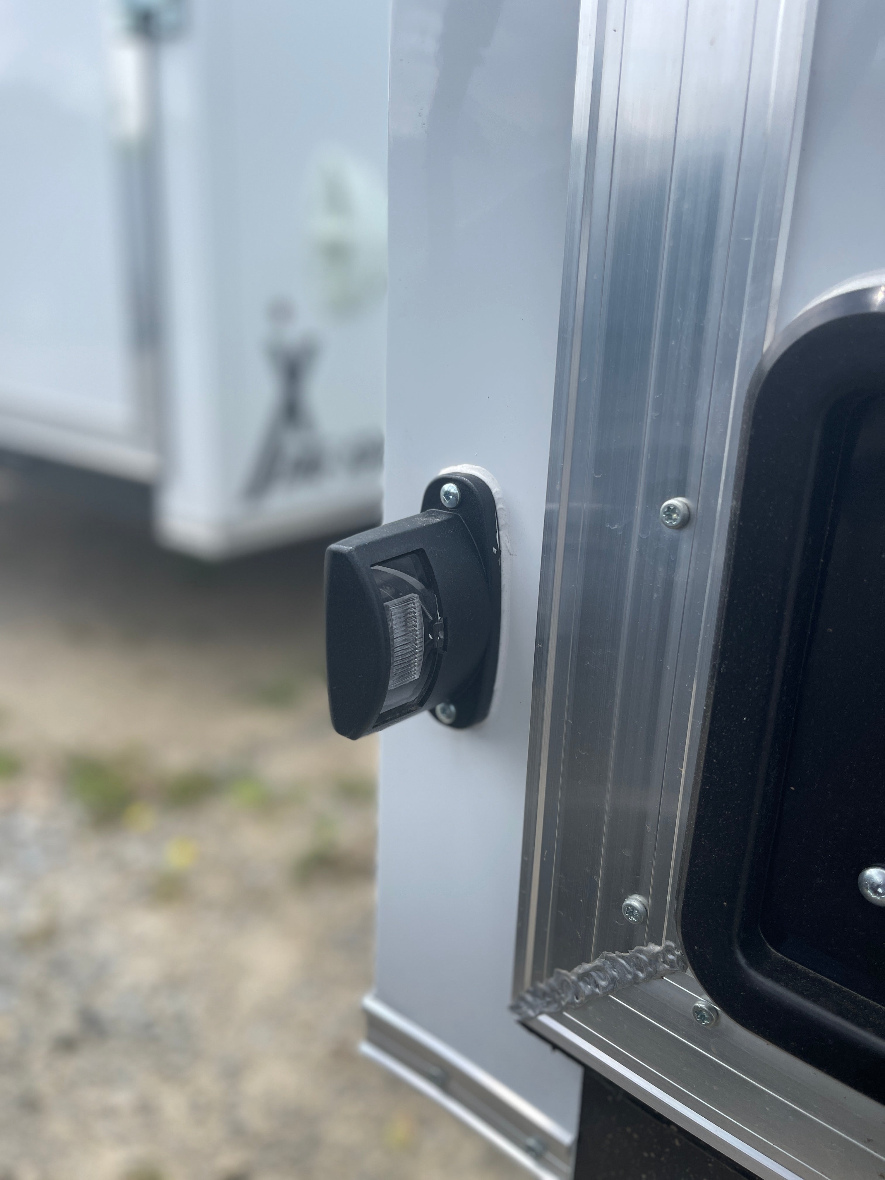 Trailer License Plate Light W/ Housing & Mounting Bracket - Clear Lens - Black Base